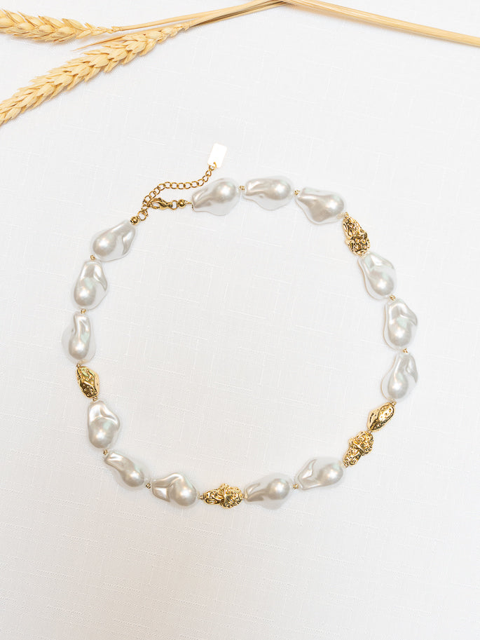 Golden pearl necklace