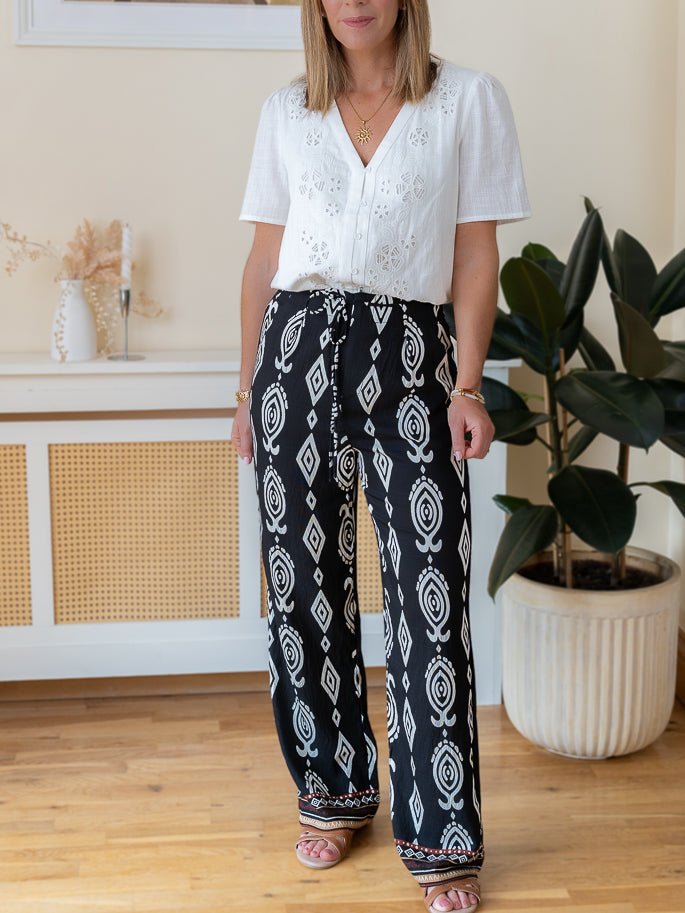 Black Leo Trousers